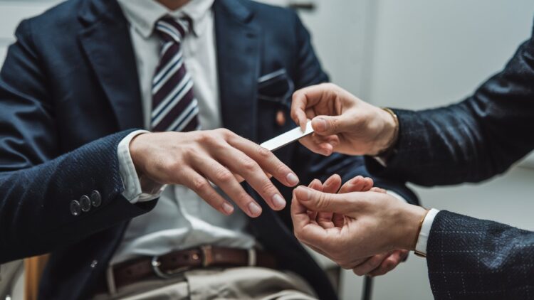 a-man-with-short-neatly-trimmed-nails-he-is-wearin-EgmH06q7TJWwbyw1LHuHjQ-7PX3GR_nRuiLIDYR8zixTQ