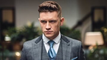 a-medium-shot-of-a-man-with-a-classic-hairstyle-he-6HHxAFg-QUibY4ejJFxw4w-NIS6aH2RQJ-XIexDabyhUg